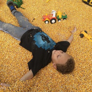 Playing in the Corn Bin
